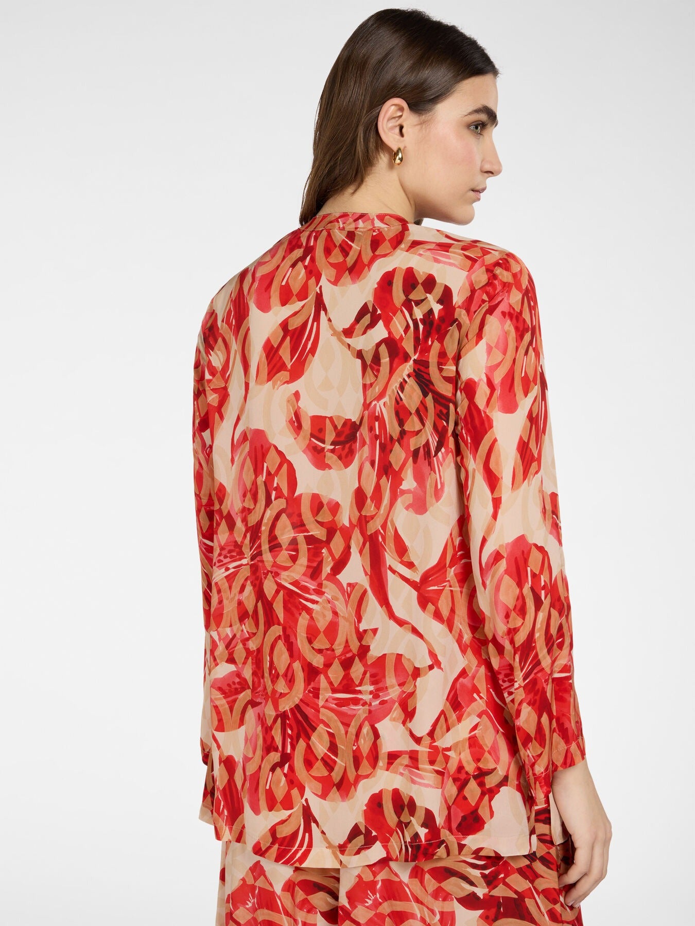 Blusa lunga stampata